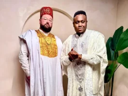 Maddox Jones in a traditional Yoruba Àgbàdá, celebrating the #FantasticOpenVerseChallenge with Great Adamz.